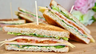 Club sandwich with ham and cheese. Delicious sandwich recipe