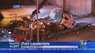 Bad Wreck Leaves Semi-Truck Dangling Over I-95 Overpass