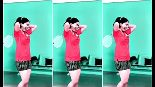 a beautiful girl is playing in a badminton funny way 😊😊