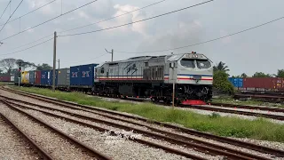 KTMB Class 26113 Tanjung Puteri loco with container wagons from West Port at Jalan Kastam station.