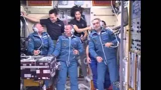 New Crew Arrives, Boards ISS