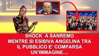 COMMOZIONE A SANREMO MENTRE CANTAVA ANGELINA MANGO..TRA IL PUBBLICO E' COME SE FOSSE PRESENTE ....