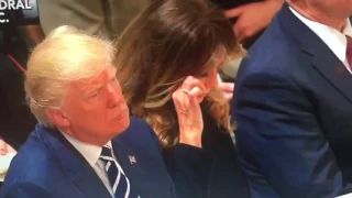 MELANIATRUMP wipes a tear