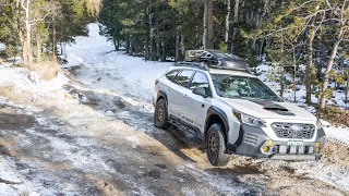 Subaru Outback Wilderness climbs an icy trail with Raceworks Coilovers and Maxxis AT tires!