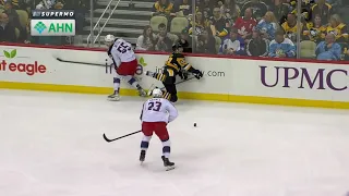 Scrum ensues after a dangerous hit by Carson Meyer on Teddy Blueger