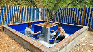 Process of applying cement and painting for ornamental fish ponds and installing drainage pipes