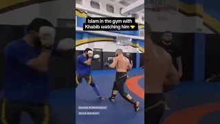 Khabib watching Islam Makhachev in the gym (via nurmagomedov_mma_school/IG)