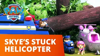 PAW Patrol | Chase's Ultimate Police Cruiser Helps Skye's Stuck Helicopter! | Toy Episode
