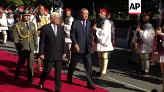 Erdogan reviews Greek honour guard