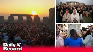 Thousands gather at Stonehenge at sunrise to mark the summer solstice