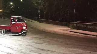 snow and the three wheel ape in Barga, Tuscany,  ITALY