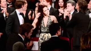 Rob and Kristen kissing at the Cannes