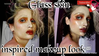 A Pat McGrath glass skin inspired makeup look.