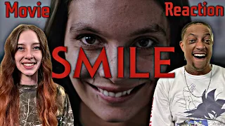 SMILE (2022) | MOVIE REACTION | Our First Time Watching | ITS NOT WHAT YOU THINK ! | CRAZY AWESOME😱