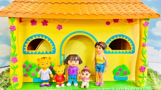 Daniel Tiger VISITS Dora The Explorer Talking Dollhouse Learning SPANISH Toys Videos For Kids