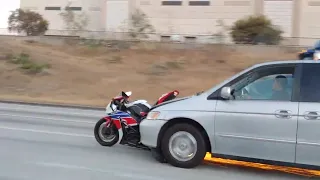 Hit-And-Run Driver Speeds Down Freeway In Corona With Motorcycle Wrapped Around Front Bumper