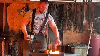 Forging a battle axe from a semi truck leaf spring.
