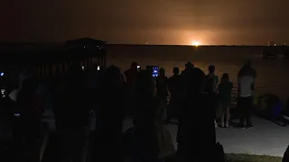 Spectators watch SpaceX Crew-4 launch