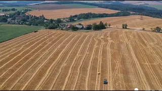 Svážení slámy. New Holland, John Deere & Case