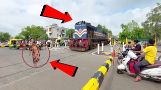 Idiot Woman Stuck in Front of Indian Railways Aggressive Locomotive at Railgate