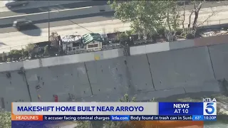 Makeshift home built along side 110 Freeway in L.A.