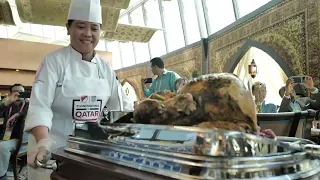 MLS Commissioner Don Garber Carves the Turkey with MLS Ambassadors and USSF Brass