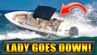 LADY GOES DOWN AT BOCA INLET !! | HAULOVER INLET BOATS | WAVY BOATS