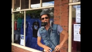 The ridiculously talented Juzzie Smith busking at the Blues at Bridgetown festival