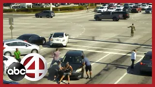 Good Samaritans stop moving car to help driver suffering medical emergency