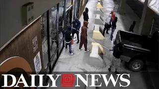 Security camera footage shows robbers looting Texas gun store