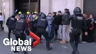 Violent clashes between Catalan riot police and pro-independence protesters in Barcelona