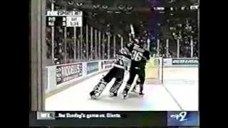 Martin Brodeur slashes Matthew Barnaby from behind