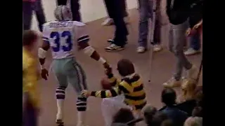 Tony Dorsett Hit Gilbert Little on sidelines 1986