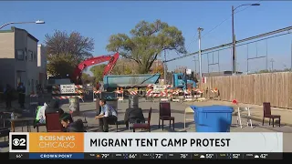 Protesters try to halt construction on Chicago migrant tent camp