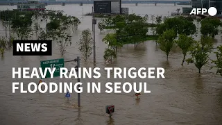 Heavy rains trigger flooding along Seoul's Han river | AFP