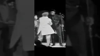 Fan jumps on stage and James Brown reacts in Boston 1968