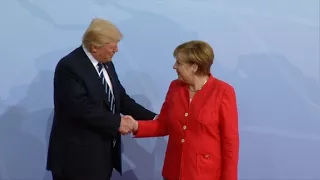 Trump, Putin and Erdogan greeted by Merkel at G20