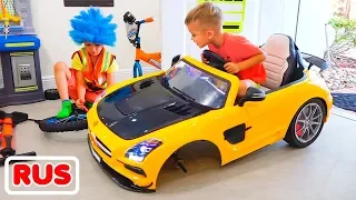 Влад меняет колёса на игрушечной машинке Никиты