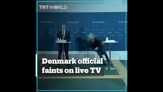 Denmark official faints during Covid-19 conference