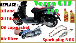 Vespa gts 300 change: oil cup gasket, oil change, spark plug, air filter