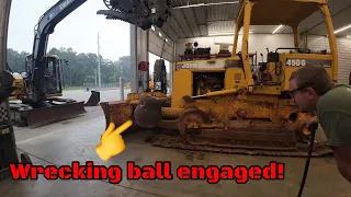Transmission removal in a John Deere G series dozer and the wrecking ball makes an epic comeback