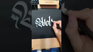Gothic calligraphy on black paper. (shorts) #calligraphy