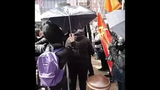 Umbrella-Wielding Protesters Counter Trump Supporters in Front of Ohio Statehouse