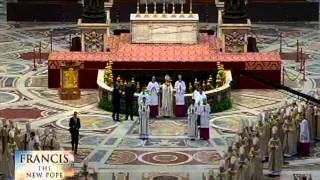 Pope Francis prays as he visits the tomb of St. Peter