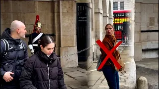 WOMAN IN REAL SHOCK, after the king’s guard YELLS her at the horse GUARDS