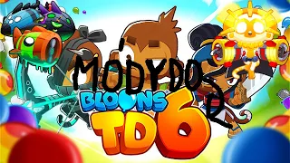 Jak dát a odstranit módy do a z Bloons TD 6.