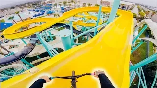 BMX VS WATERPARK! (DOWN THE BIG SLIDES)