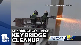 Officials describe bridge collapse cleanup process