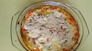 МИНТАЙ, ЗАПЕЧЕННЫЙ В ДУХОВКЕ С ЛУКОМ, МОРКОВЬЮ И СЫРОМ. POLLOCK WITH CHEESE BAKED IN THE OVEN.