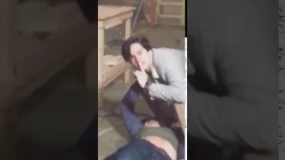 Cole Sprouse plays around with KJ on Riverdale set.